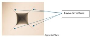 Impronta Vikers con linee di frattura ben visibili